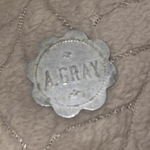 A. Gray good for five cents in trade ￼token - $1.97