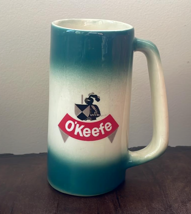 CARLING OKEEFE BEER TURQUOIS &amp; WHITE SLANTED LAURENTION CERAMIC MUG - $24.03