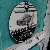 Vintage 1960 Pontiac &#39;&#39;A General Motors Masterpiece&#39;&#39; Porcelain Gas &amp; Oil Sign - £97.78 GBP