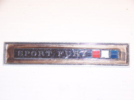 1965 Plymouth Sport Fury Door Panel Emblem Oem #2572459 - £52.77 GBP