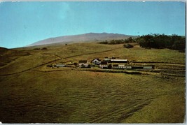 Parker Ranch Center Kamuela Hawaii in view of Mauna Keas peak Hawaii Postcard - $9.85