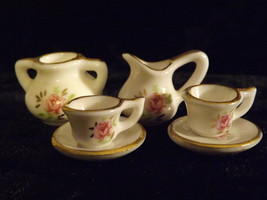very fine porcelain dolls house tea set, 2 cups with 2 saucer 1 milk jug and 1 s - £7.84 GBP