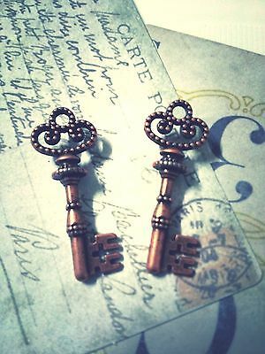 Primary image for 25 Skeleton Key Pendants Steampunk Antiqued Copper Charms Findings 2 Sided