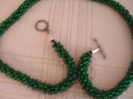 Kumihimo Beaded Necklace 21.75 inches In green, silver-lined glass beads... - $60.00