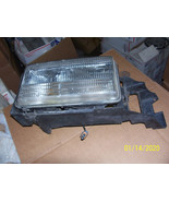 1994 1995 1996 FLEETWOOD BROUGHAM HEADLIGHT &amp; BRACKET LEFT OEM USED CADI... - $5,278.01 MXN