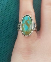 Cute large oval turquoise ring with detailed heart band size 6 - $20.40