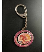 Disney Ariel, Aurora, Belle, Cinderella Spinner Key Chain - $109.09 MXN