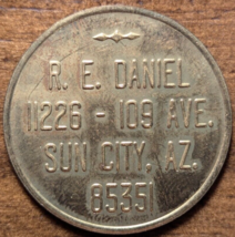 Sun City, Arizona AZ R. E. Daniel Coins Medals Tokens Dealer Advertising Token - $11.29