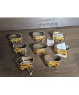 Vintage Set 8 Kemp &amp; Beatley Silver/Gold Bow Footed NAPKIN RINGS Porcelain - $21.73
