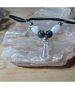 Crystal point &amp; Snowflake Obsidian pendant. - $18.00