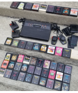 vintage Atari 2600 Console &amp; 57 games lot 1980&#39;s joysticks paddles Untested - $219.99