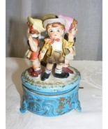 Vintage Porcelain Figurine 4 Children on Music Box Made in Sankyo Japan - $37.34