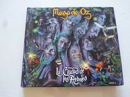 Mago de OZ Die ciudad de los Arboles 2007 Warner - CD+DVD Book Esp Am - $598.79 MXN