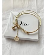 Dior Parfums Goldtone Bracelet with charms Adjustable  NEW in Box  - $62.26 CAD
