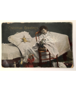 Early 1900&#39;s  Christmas PC Printed in Saxony Child on Chair By Dolls and... - $10.00