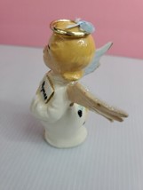 Porcelain Angel Figurine Holding Hynes book with child design in back Box 7 - £6.38 GBP