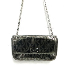 Michael kors Purse Signature mongram clutch 210537 - $551.21 MXN