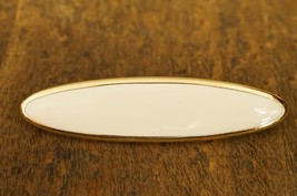 Vintage Costume Jewelry Monet Gold Tone Metal Cream Enamel Oval Bar Brooch Pin - £11.86 GBP
