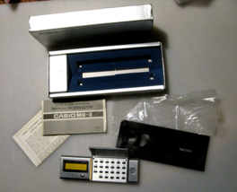 Casio MQ-2 Micro-Quartz Computer Calculator original box manual 1978 eng... - $646.35 MXN