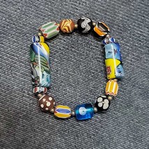Vintage african venetian style glass with afghani big brass beads bracelet - $490.45 MXN