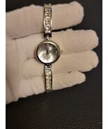 Vintage Silver Tone and Crystal Womens Quartz Watch with Flower Dial Works - $9.90