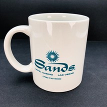 Sands Hotel and Casino Las Vegas White Ceramic Mug with Teal Sun Logo 10 ounce - £9.59 GBP