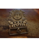 S.M.D.A. SECURITY BADGE BX 12  - $1,332.36 MXN