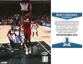 Dikembe Mutombo signed Atlanta Hawks basketball 8x10 photo Beckett COA a... - £74.03 GBP