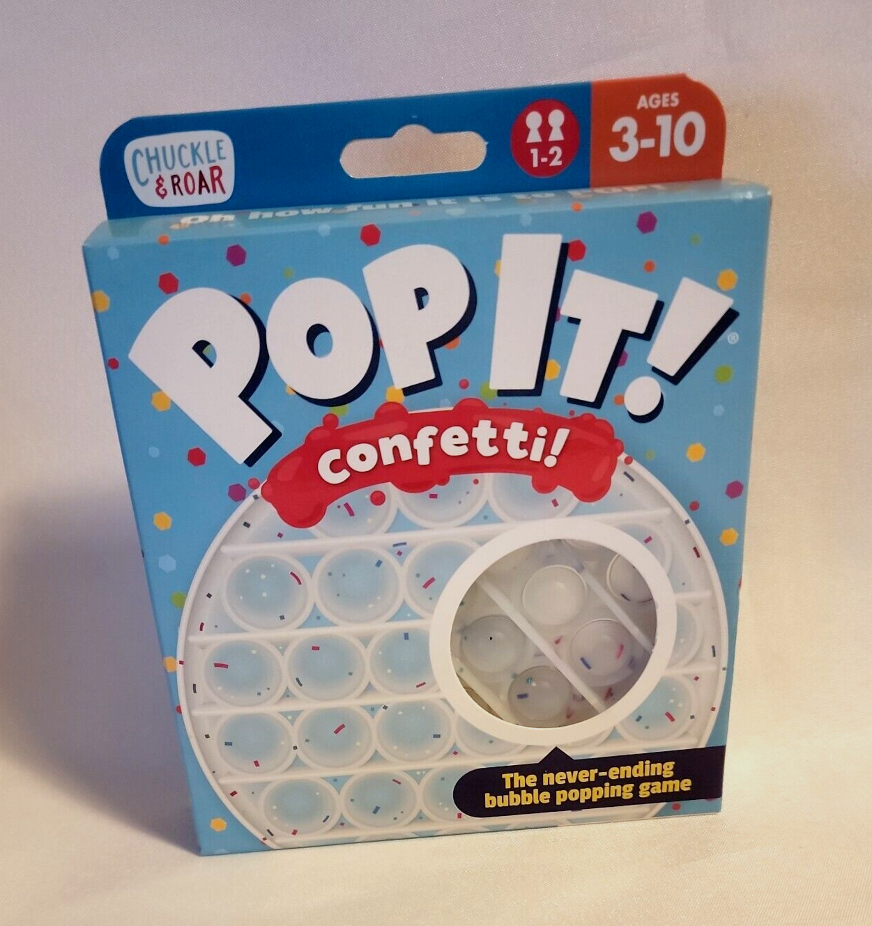Buffalo Games Chuck & Roar Pop-It Confetti Never Ending Popping Game 5