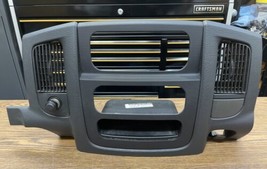 2002-2005 Dodge Ram 1500 2500 3500 Radio Heater Control Dash Bezel OEM - $69.29