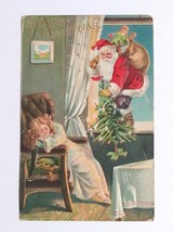 A Merry Christmas Santa Sneaking Past Sleeping Child Embossed Postcard c1910s - £10.29 GBP