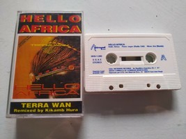 An item in the Music category: Hello Afrique Terra Wan Remixed By Kikamb Hura 1991 - Cassette Tape-
show ori...