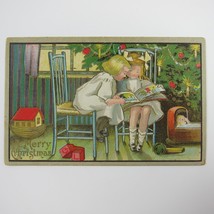 Christmas Postcard Children Boy Girl Sit Read Tree Toys Gold Embossed Antique - £7.81 GBP