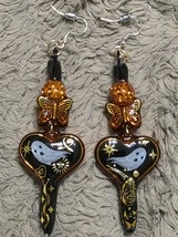 Adam's Family values;"Mortisha's Preference"deep construct earings.C.2026 - $38.00