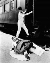 Laurel and Hardy Stan steps on Ollie whilst boarding train 8x10 real photo - $10.99