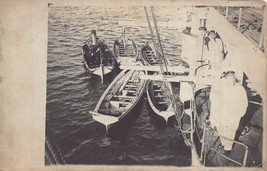 WW1 ERA SAILORS IN SMALL BOATS BOARDING MILITARY SHIP~PHOTO POSTCARD - £6.97 GBP