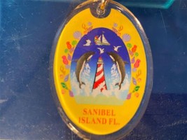 Florida Souvenir Sanibel Island Dolphins Keychain Bag Clip Lighthouse Bo... - £9.63 GBP