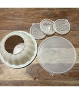 Tupperware 5 Piece Jell N Seal - Christmas Tree, Star, &amp; Tulip Molds - $11.30