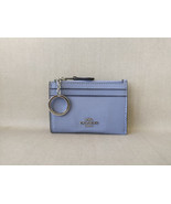 Étui à cartes Coach Mini Skinny ID zippé en cuir grain croisé T 9137 - $727.47 MXN