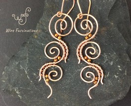 Handmade copper earrings: three wire wrapped spirals - £26.37 GBP