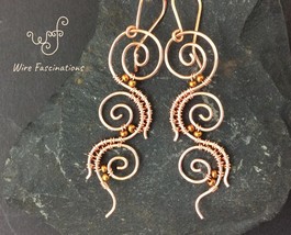 Handmade copper earrings: three wire wrapped spirals - £26.37 GBP