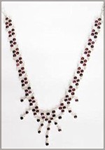 Collier Avec Argent Et Grenade - $997.43 MXN