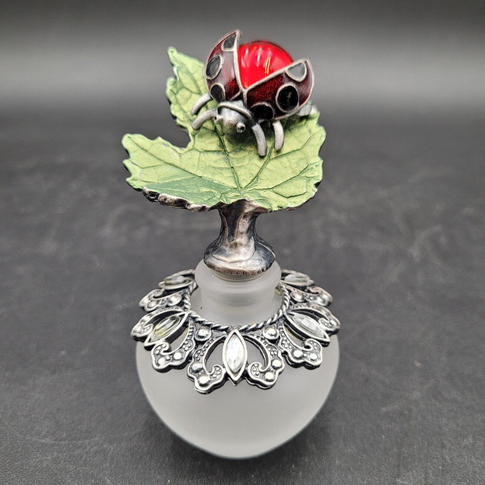 Primary image for Round Frosted Glass Hand Crafted Perfume Bottle Ladybug On Leaf Silver Overlay