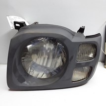 02 03 04 Nissan Xterra XE left drivers headlight assembly OEM - $64.34