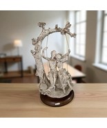Vintage Figurine Giuseppe Victorian Courting Couple on Swing Resin Marke... - $277.37 CAD