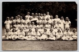 RPPC Girls In Daisies With Nun Real Photo Postcard L26 - £13.54 GBP