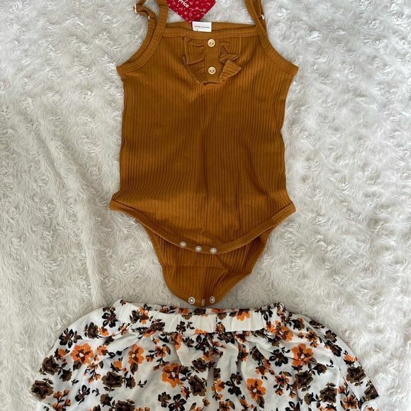 New 9-12mo 2pc Ruffle Front Body Suit &amp; Floral Skirt - $20.99