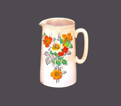 Lord Nelson Pottery pitcher made in England. Orange, yellow flowers. Flaws. - £29.99 GBP