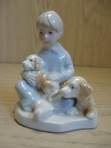 Figurine Statue Ceramic Little Boy Sitting With Puppies Blue Hues - $6.95
