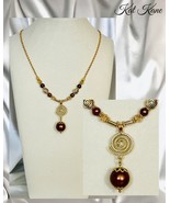Chocolate Pearl Golden Drop Pendant In Spiral Frame - $19.31